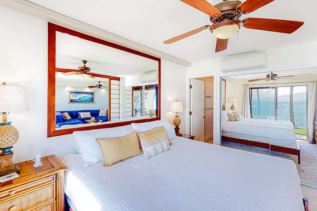 Oceanfront condo with lanai, pool, grill, beach gear, smart TV, W/D, partial AC