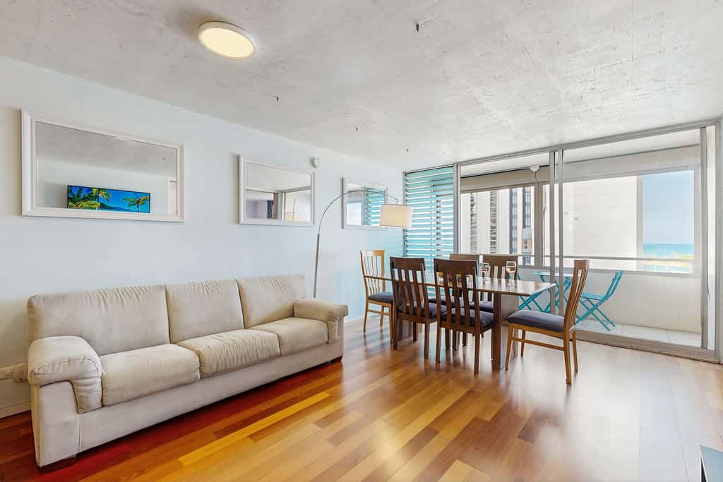 Ocean & Harbor view Waikiki getaway with a covered lanai - walk everywhere