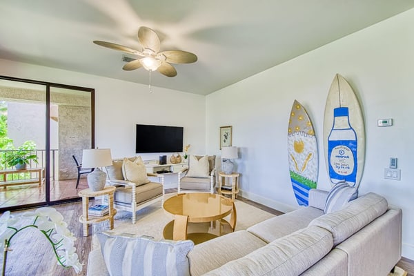 Elegant, second floor condo with lanai, pool and hot tub access, and central AC