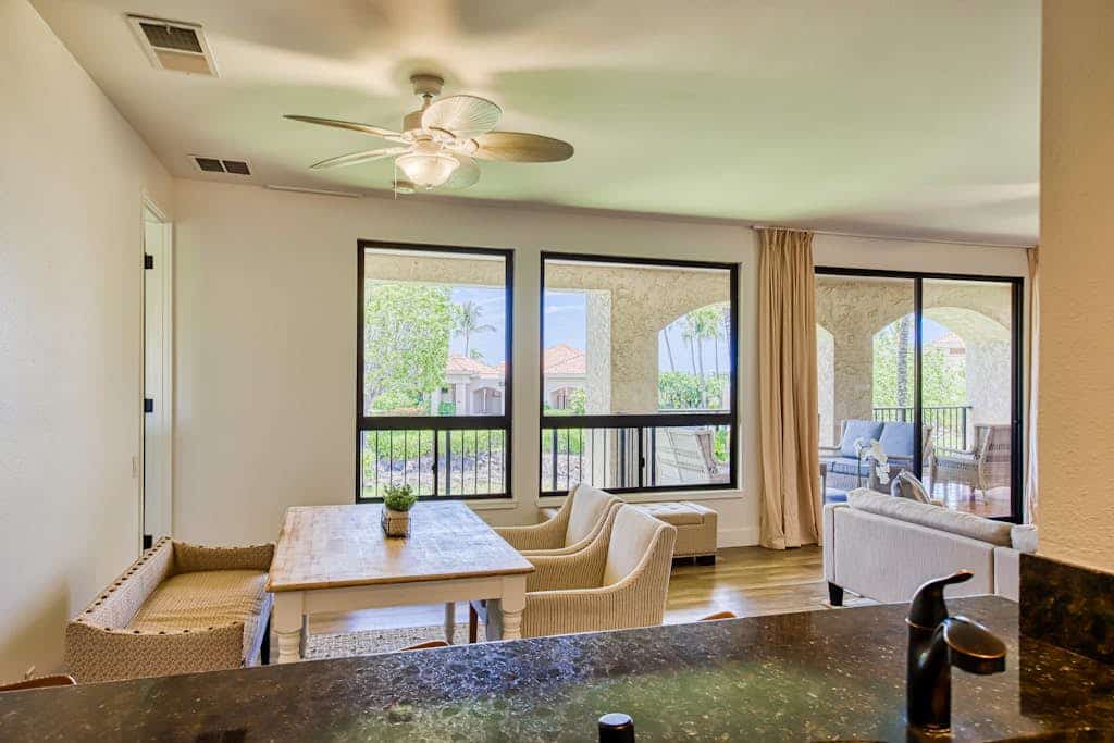 Elegant, second floor condo with lanai, pool and hot tub access, and central AC