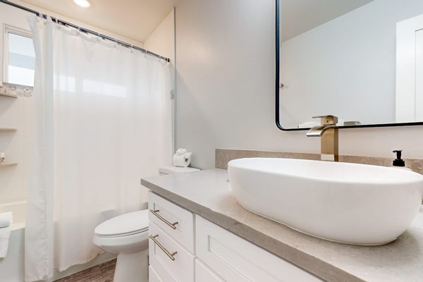 Bright & modern dog-friendly oasis on two lush acres with generous patio & W/D