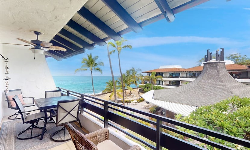 Waterfront condo with shared pools, private beach, lanai, W/D, and AC