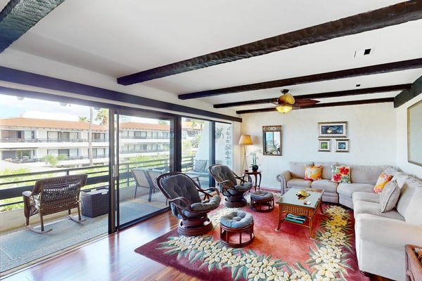 Waterfront condo with shared pools, private beach, lanai, W/D, and AC