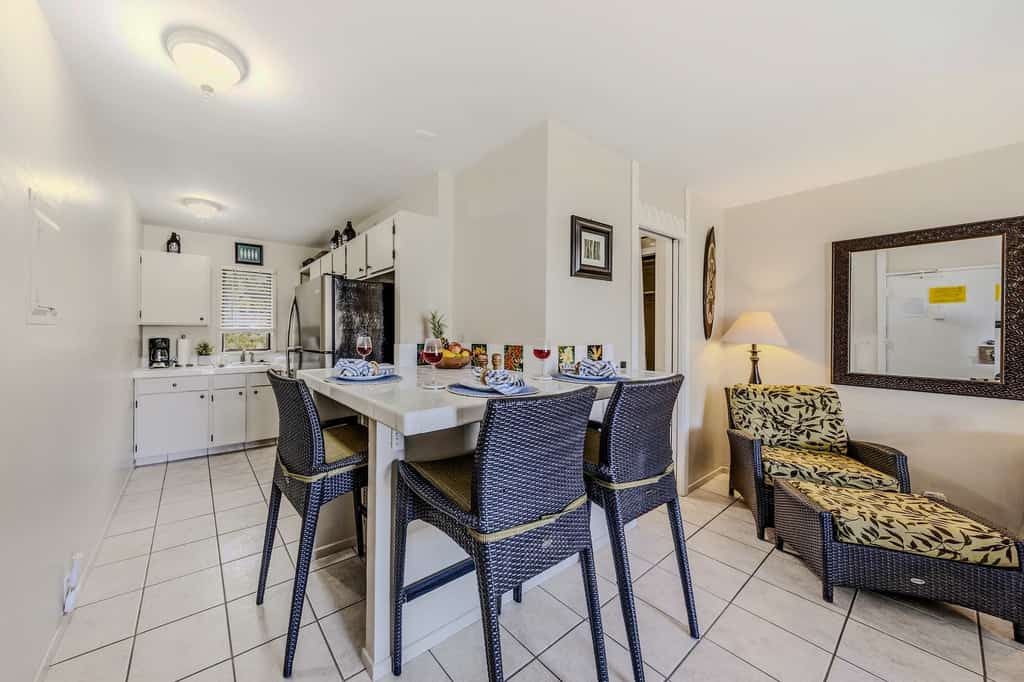 Cozy studio with a shared pool, hot tub, and grill area, steps from the beach with a partial ocean view