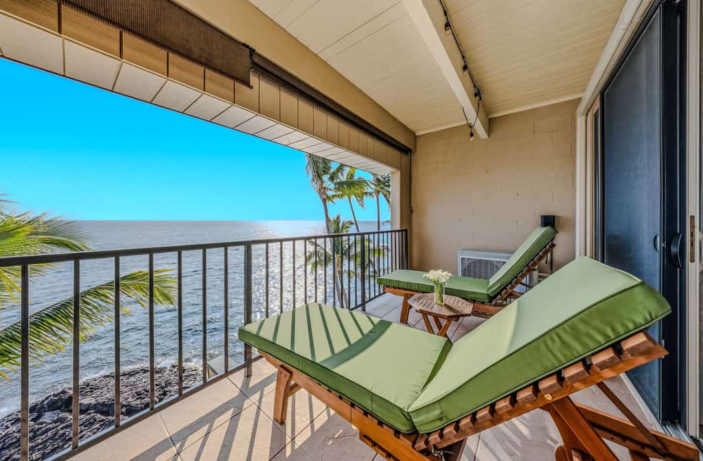 Relaxing oceanfront getaway with views from the lanai, shared pool and hot tub