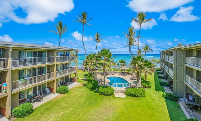Waterfront condo on the ground floor with a pool, ocean views & beach access