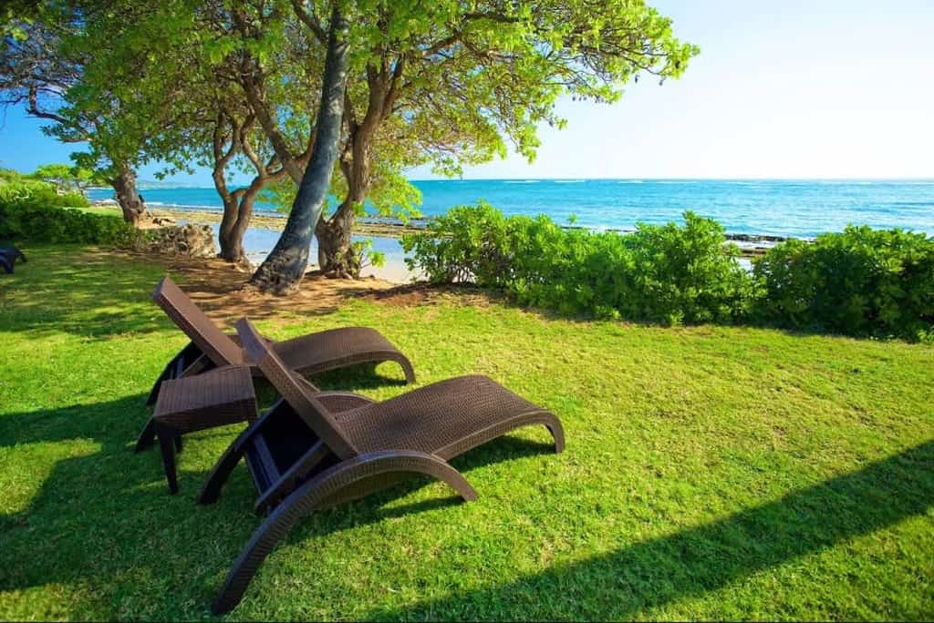 Waterfront condo on the ground floor with a pool, ocean views & beach access