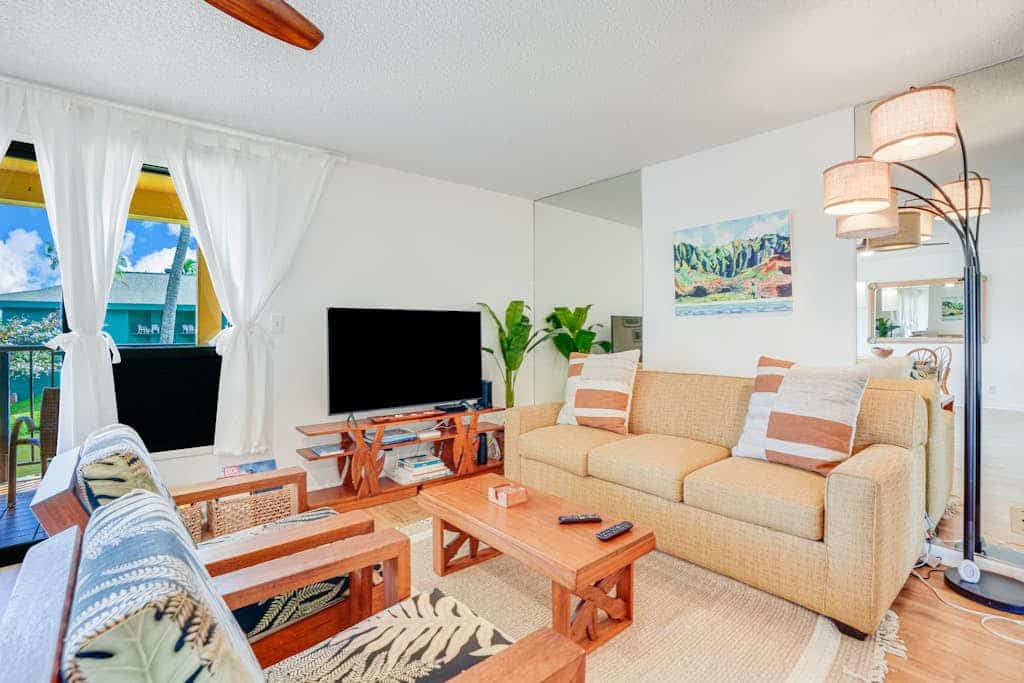 Water-view 3rd-floor condo with community pool & grills - near sights & dining