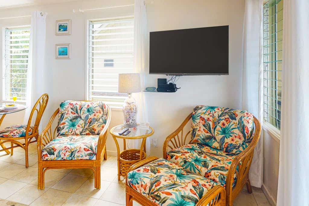 Upper-floor oceanfront studio with balcony, water views & outdoor pool