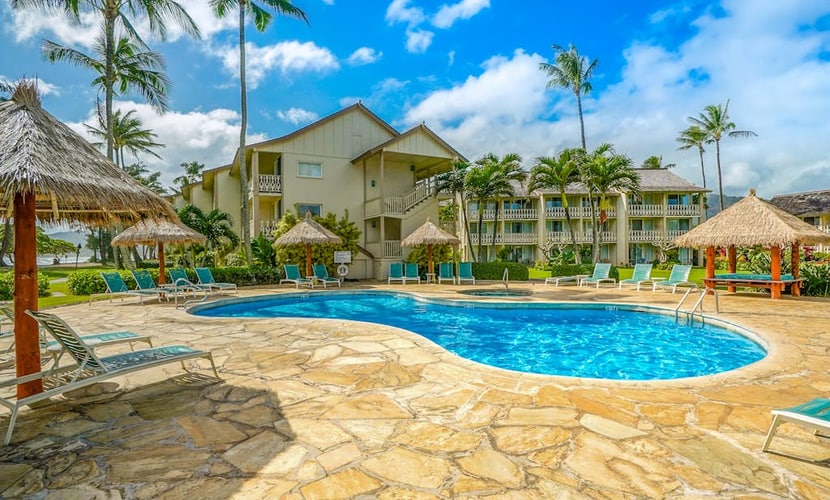 Ground-floor resort condo with ocean & sunrise views - beachside pool & hot tub