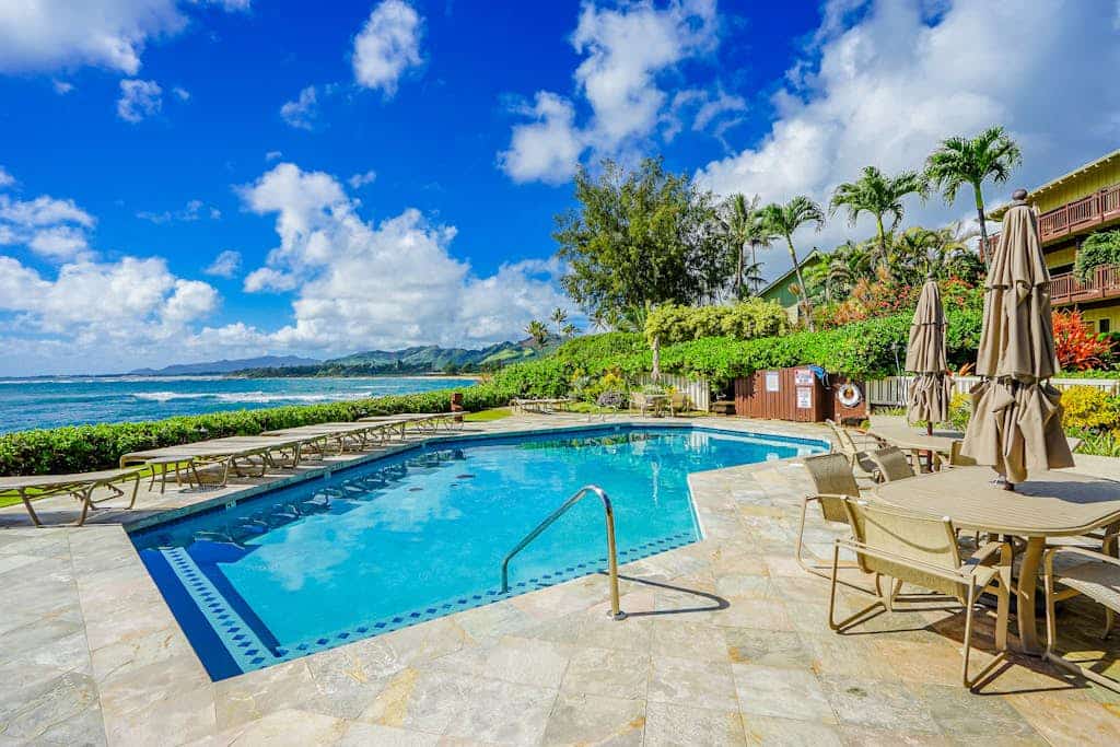 Beachfront condo with amazing pool, grill, large lanai, & children's items