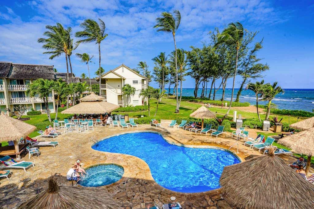 Top-floor beach condo with sweeping oceanfront views - steps to pool & hot tub