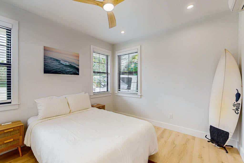 Stunning home with multiple lanais, private gym, lush green space & fruit trees
