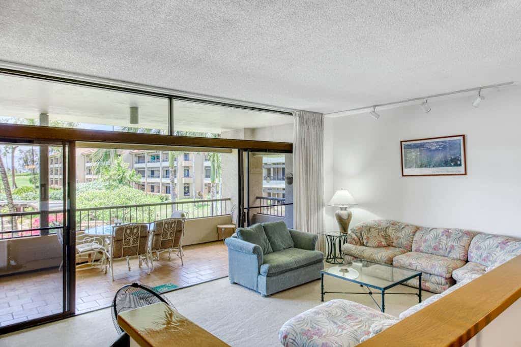 Two-story condo with lanai, shared pool, hot tub, & tennis - walk to beach
