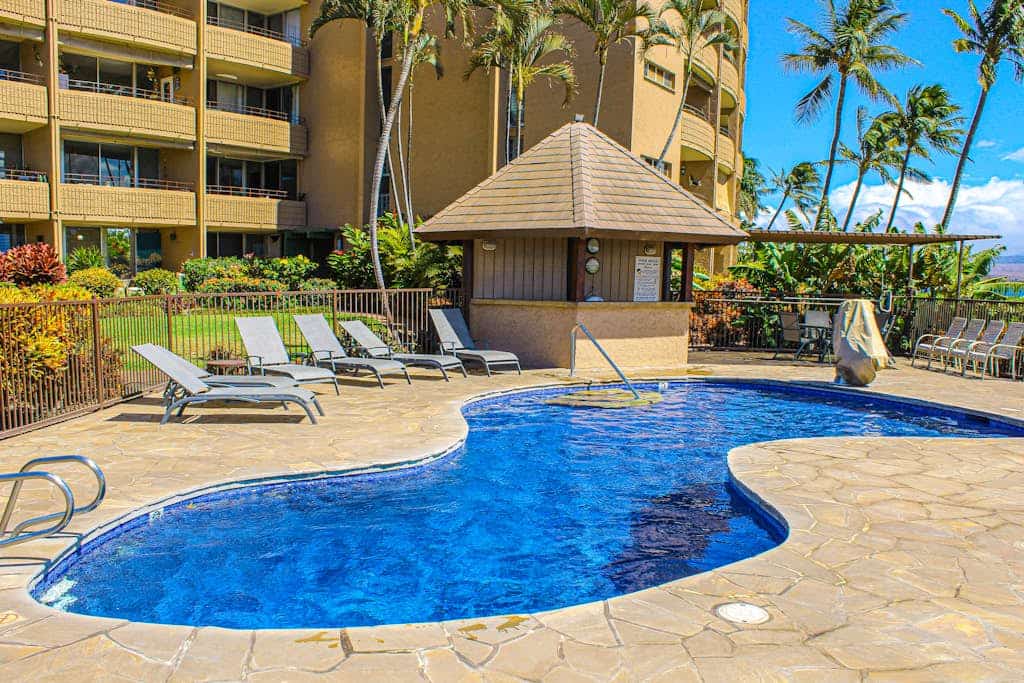 Waterfront condo w/ a furnished patio, full kitchen, shared pool - walk to beach