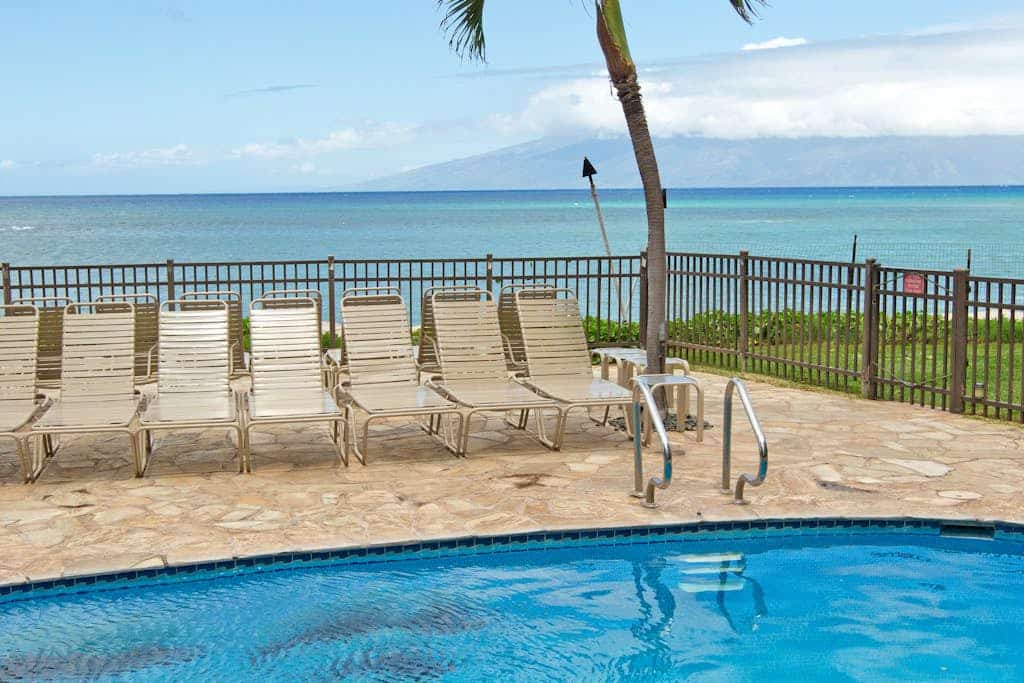 Newly remodeled oceanfront condo with pool, lanai & private W/D - near beach