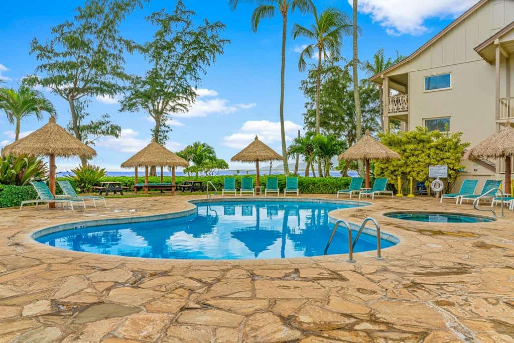 Stunning ground floor condo with ocean-view lanai - steps to the beach