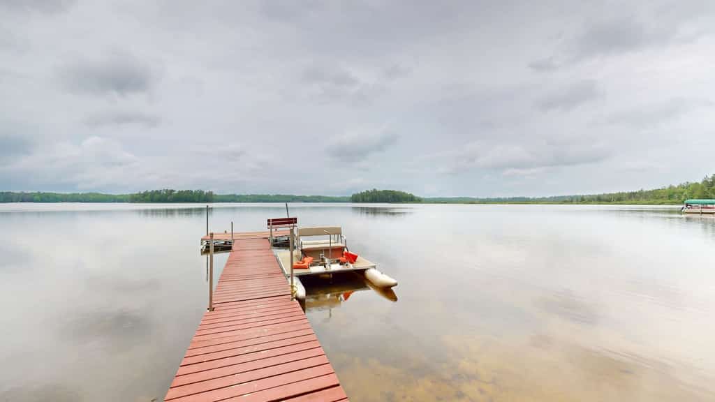 Lakefront home with, dock, kayaks, paddle boards, fire pit & more