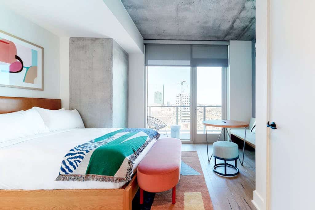Historic Rainey Street condo with city views, balcony, WiFi, and rooftop pool