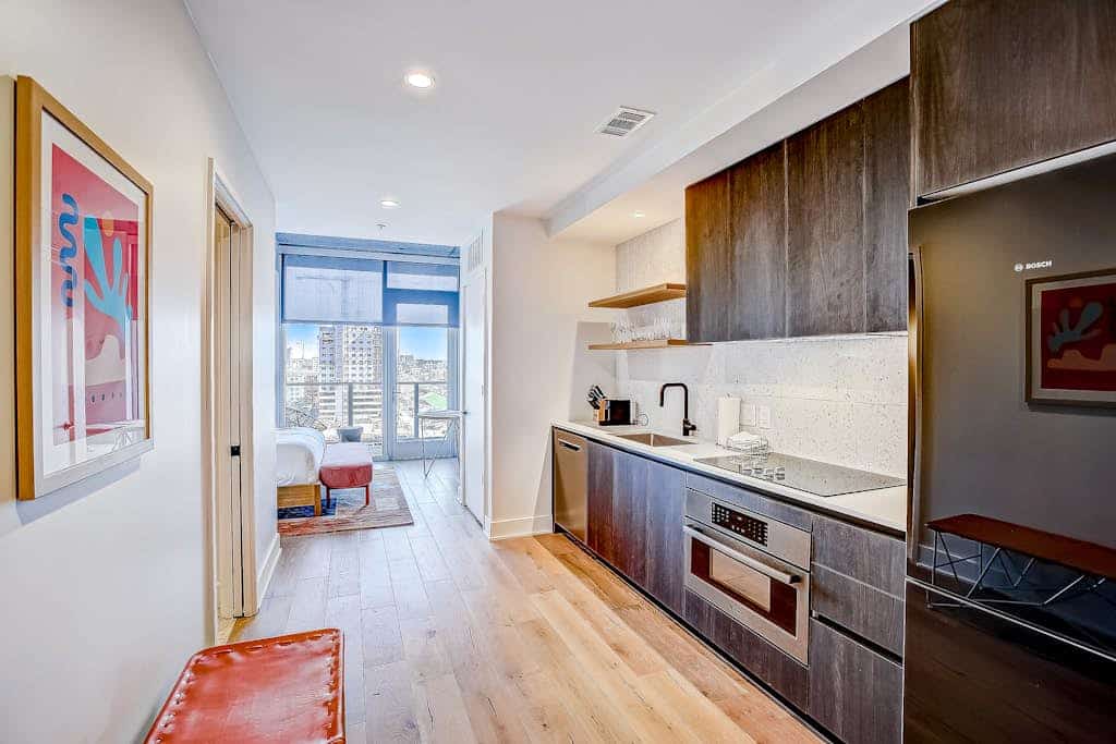 Studio condo with rooftop pool, fast WiFi, central AC & private W/D