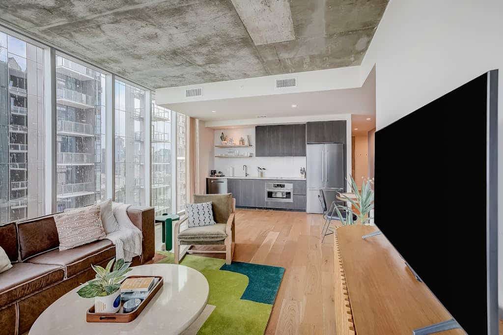 Brand-new skyline-view condo with rooftop pool, balcony, firepit, & fitness room