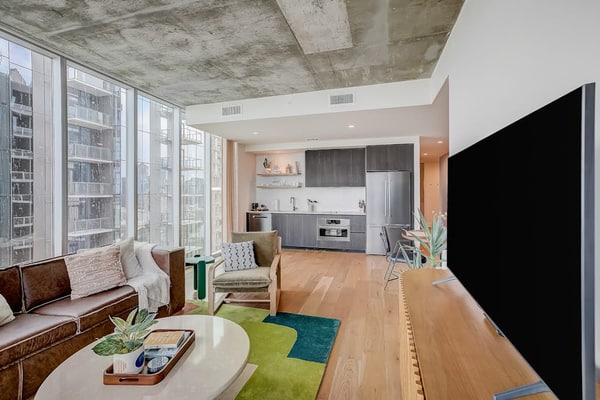 Brand-new skyline-view condo with rooftop pool, balcony, firepit, & fitness room