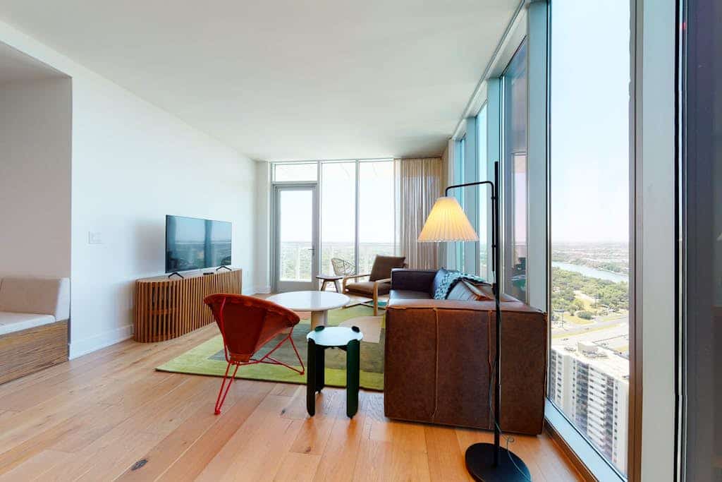 32nd-floor Rainey St condo with stunning lakeview balcony, rooftop pool & gym