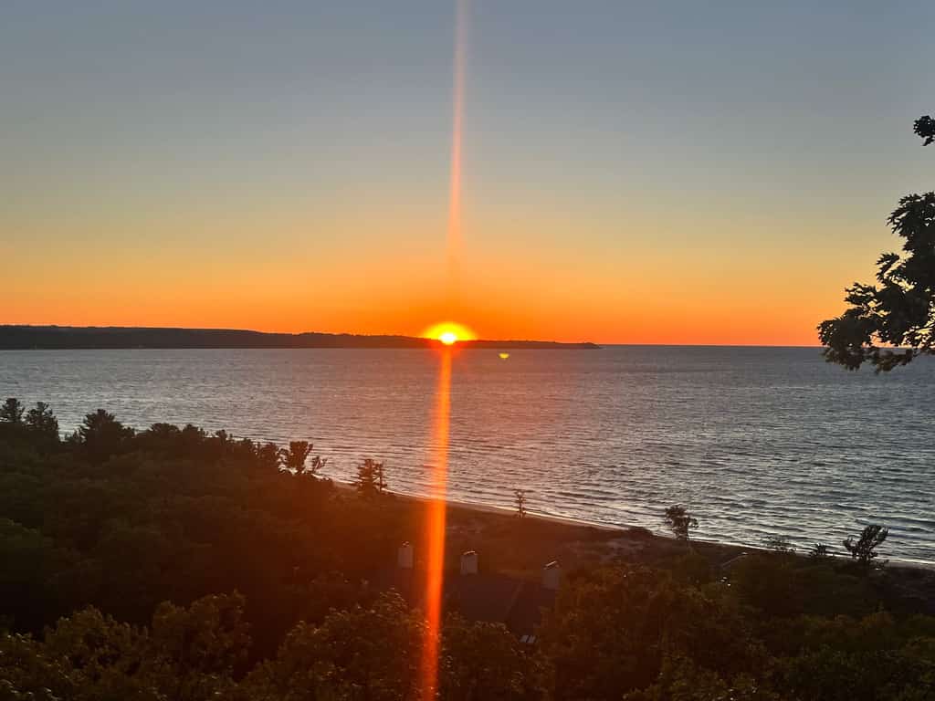 Condo in Glen Arbor with Lake Michigan sunset views, fireplace, deck, washer & dryer