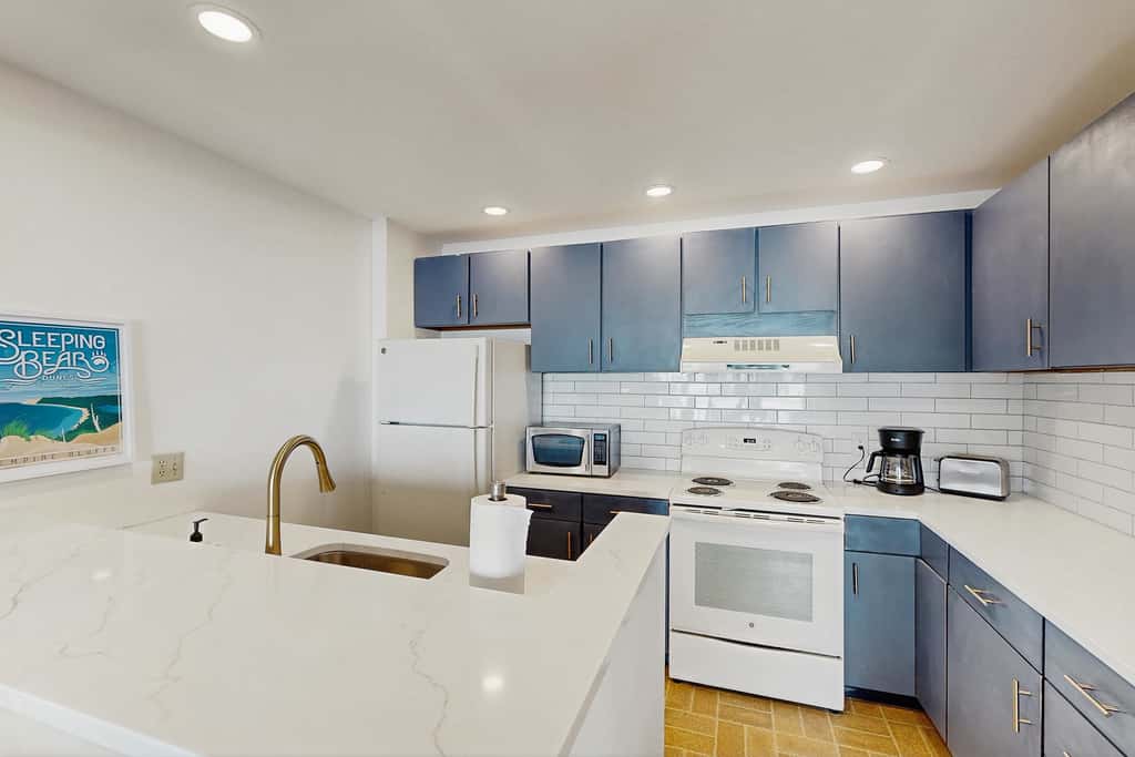 Condo in Glen Arbor with Lake Michigan sunset views, fireplace, deck, washer & dryer