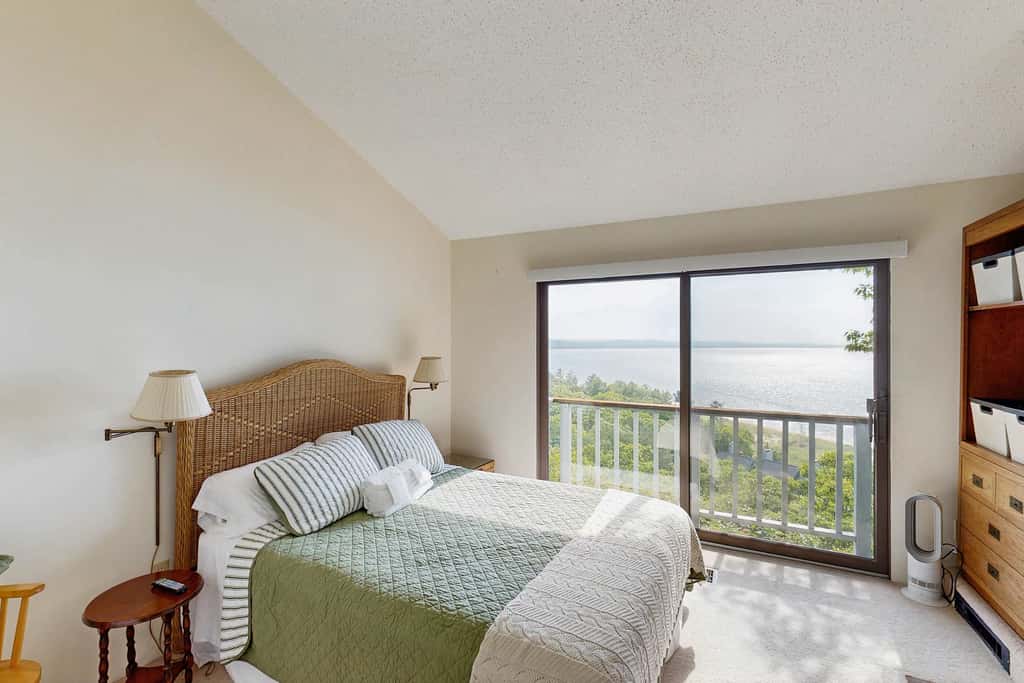 Condo in Glen Arbor with Lake Michigan sunset views, fireplace, deck, washer & dryer