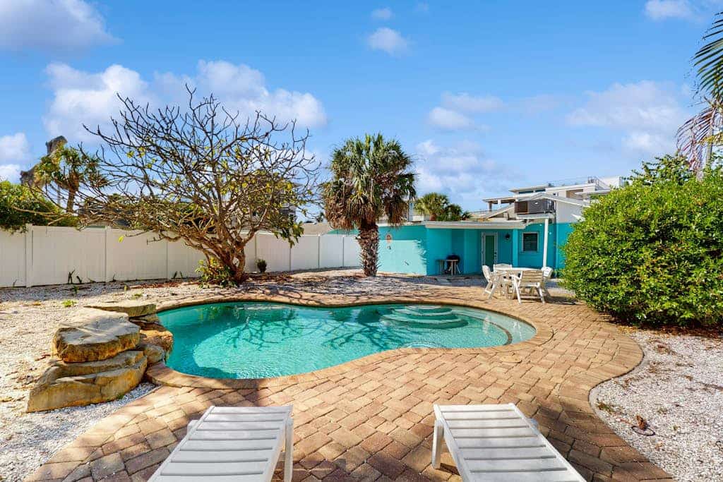Colorful beach cottage w/ heated private pool & grill area - dog-friendly