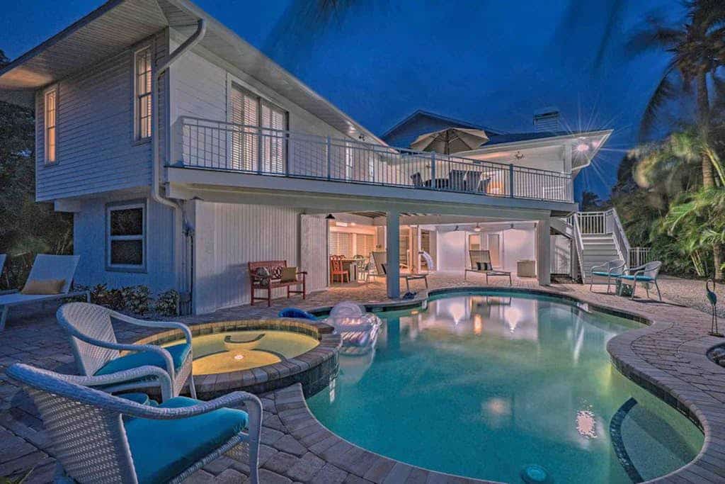 Waterfront home near beaches with private heated pool, spa, and more