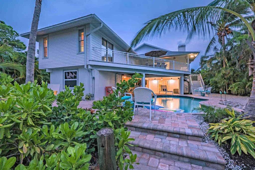 Waterfront home near beaches with private heated pool, spa, and more