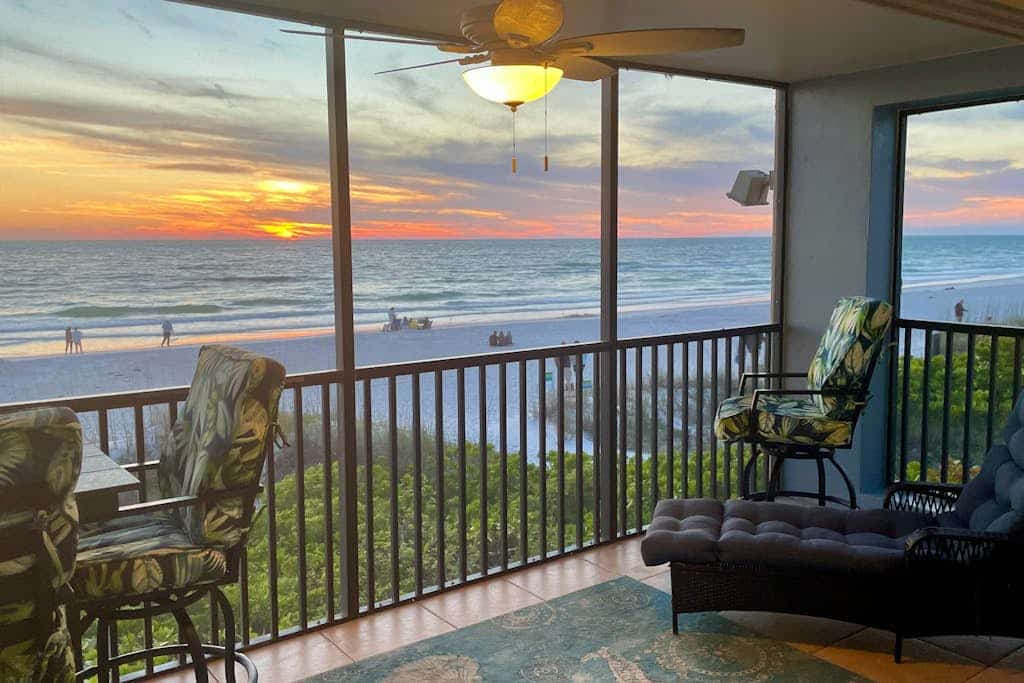 Luxury Gulf-front condo with beach access, heated pool, sunset views, & balcony
