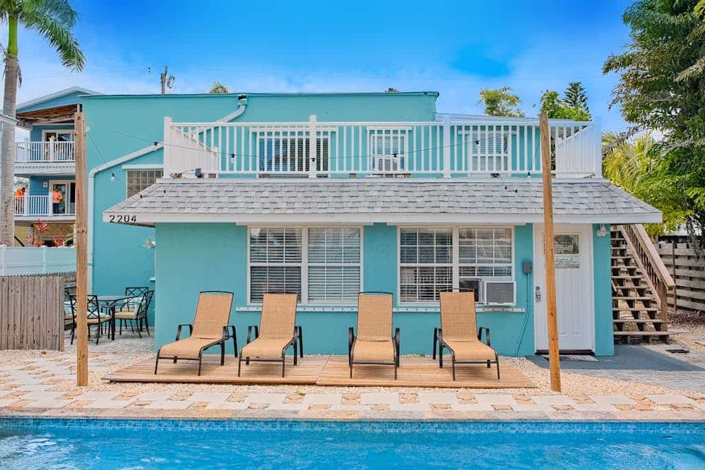 2-story duplex near beach with heated pool, grill, W/D, streaming