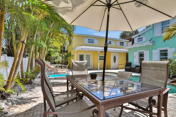 Walk-up suite with on-site pool, private deck, full kitchen - walk to beach