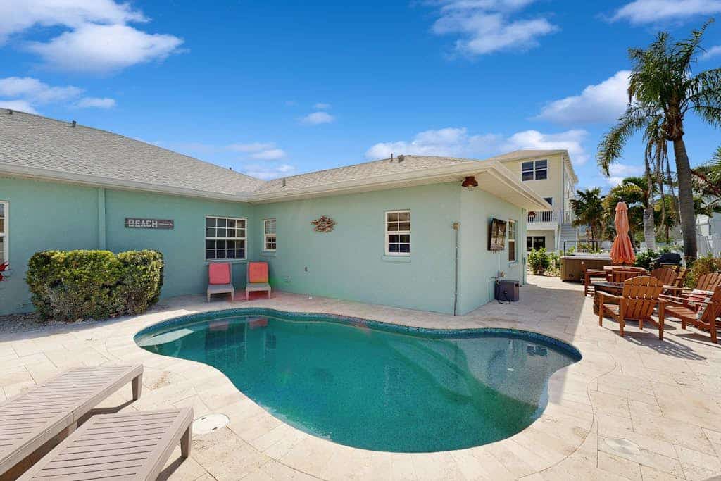 Large pool home just steps from the Gulf, fully renovated, family friendly, WIFI
