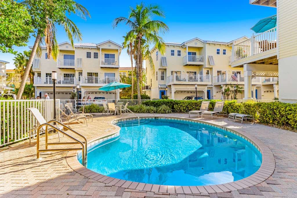 Spacious townhome with Gulf view, pool, three decks, & central AC - snowbirds OK