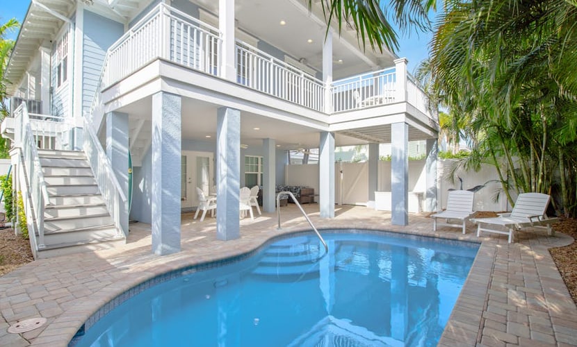 Modern home near Gulf beaches with private heated pool & WiFi