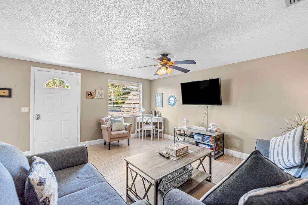 Updated duplex near beach with private yard, AC, & W/D