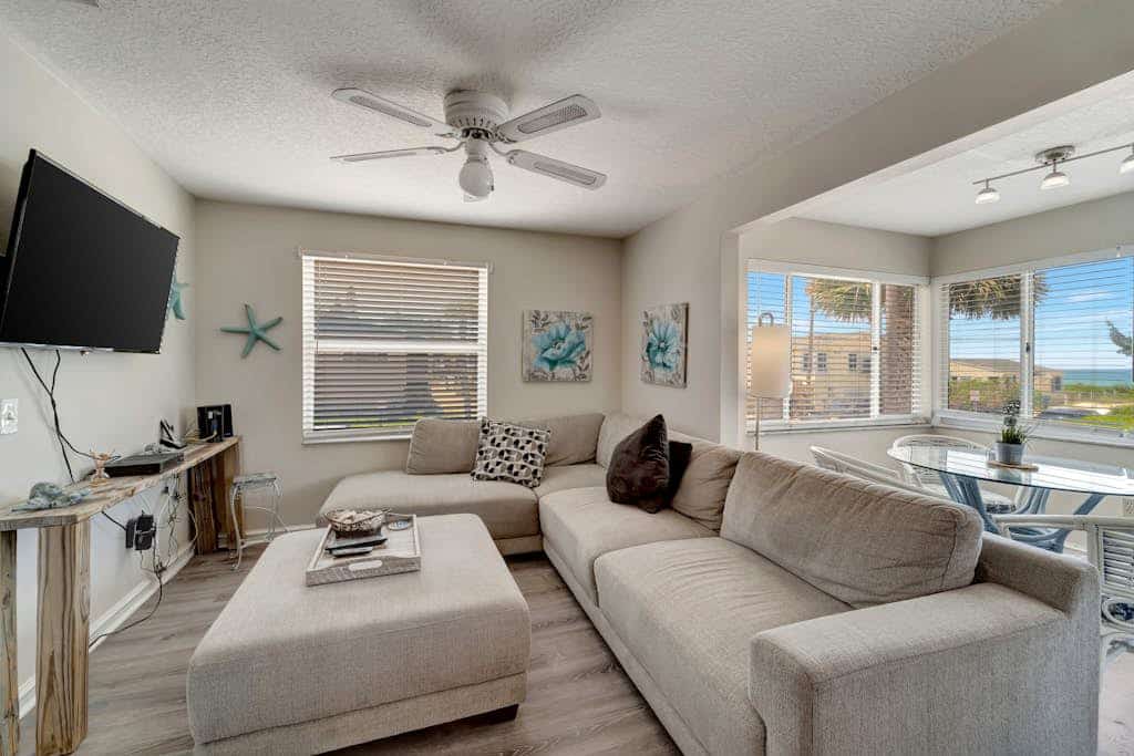 Serene oceanfront suite with Gulf view, grill, patio, central AC, & W/D