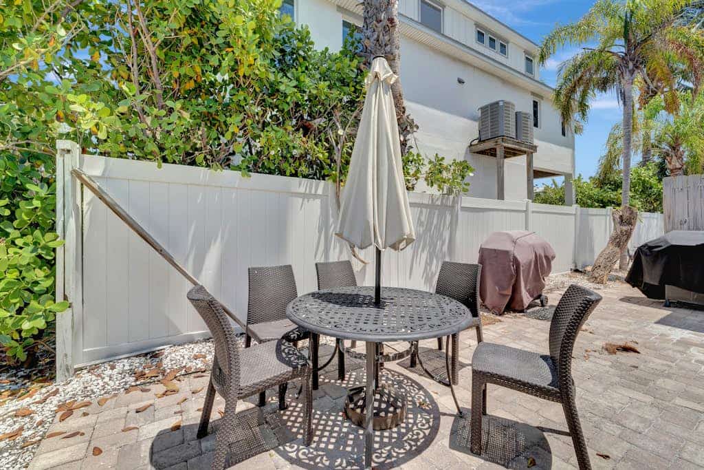 Serene oceanfront suite with Gulf view, grill, patio, central AC, & W/D