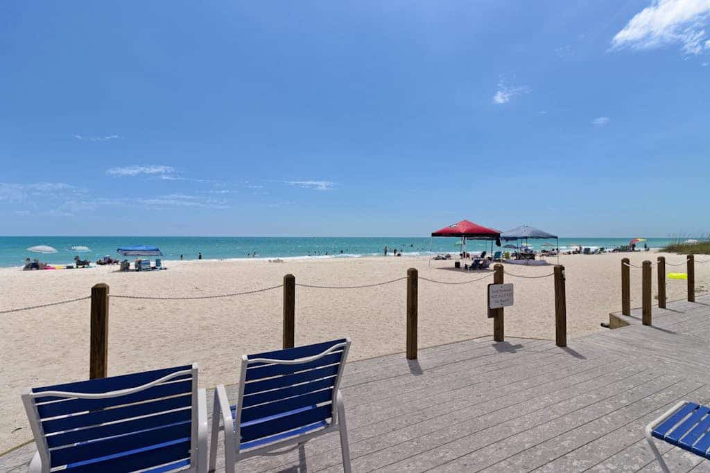 Vibrant retreat with pool, beach access, tennis, balcony, & stunning ocean views