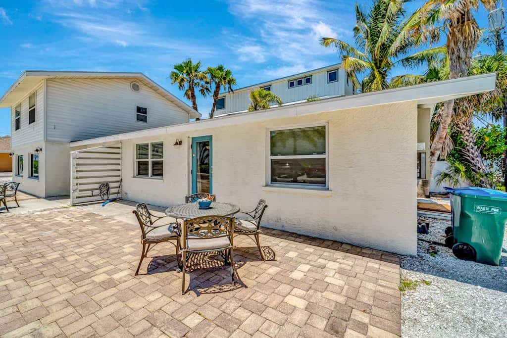 Serene oceanfront suite with Gulf view, grill, patio, central AC, & W/D