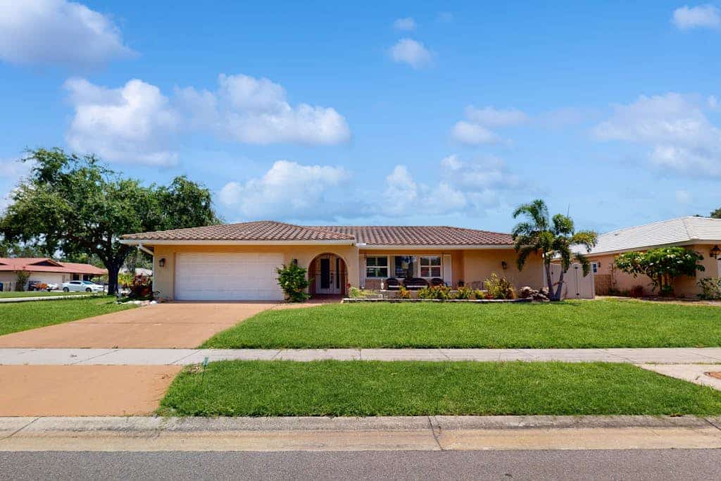 Dog-friendly house with pool, lanai, firepit, grill, patio, & enclosed backyard