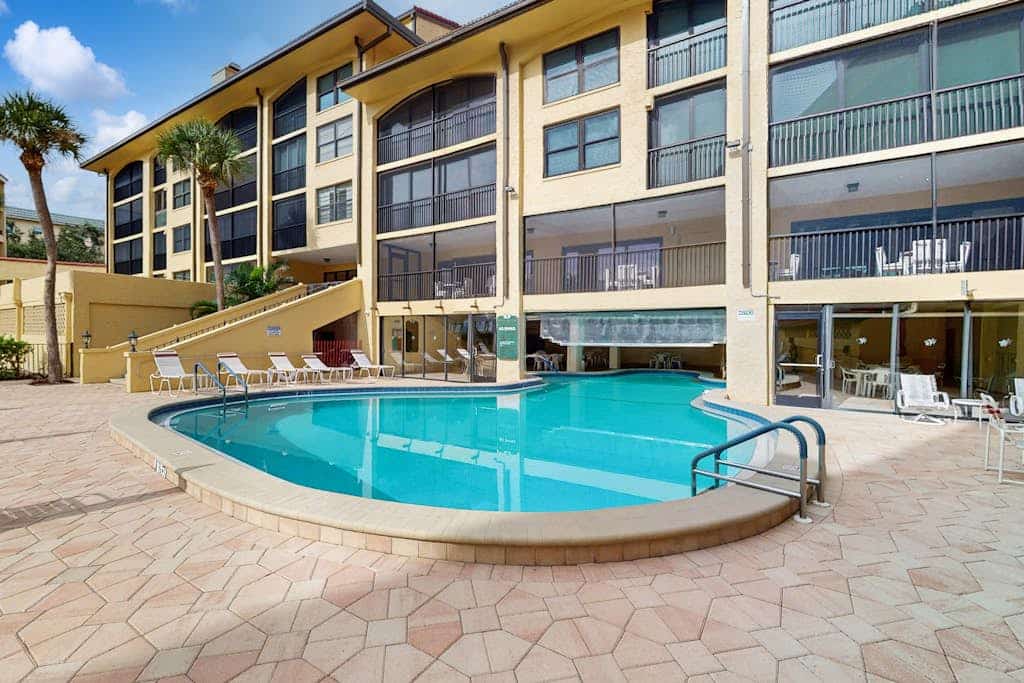 Luxurious beachfront 2-bed Siesta Key Beach condominium with pickleball, pool, and dedicated parking 
