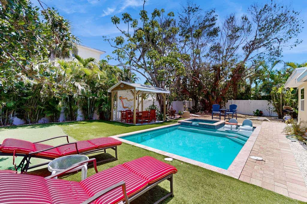 Dog-friendly home with amazing backyard, pool, spa, putting green & game room