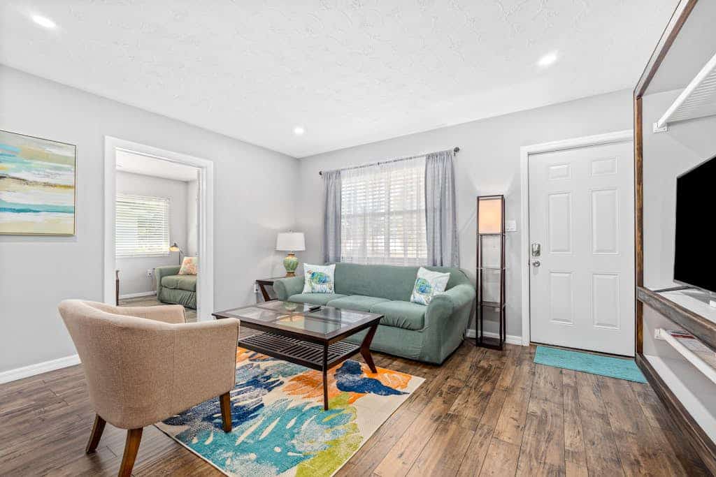 Updated, dog-friendly home with fenced yard, koi pond, firepit, & W/D