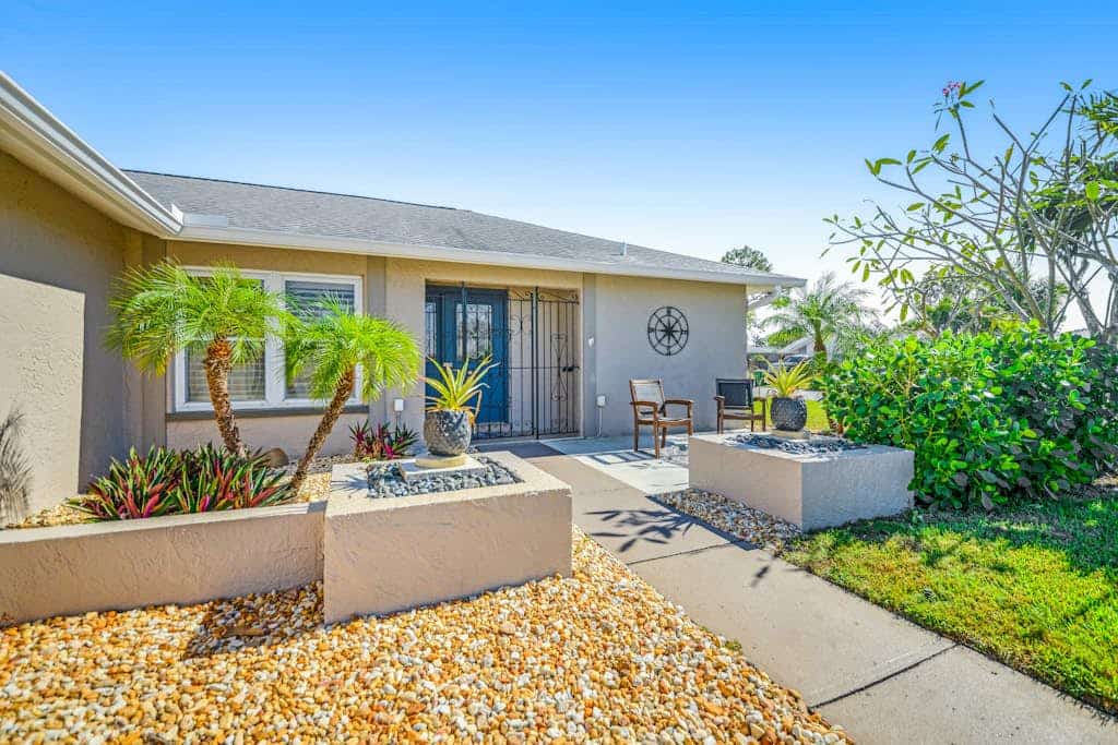 Updated home near beach with heated pool, lanai, WiFi, W/D & AC - great location