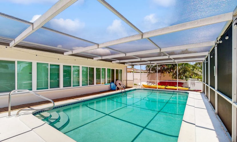 Waterfront home with private, heating optional pool, lanai, and internet